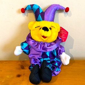 Unisex Kuddle Me Toys Yellow / Golden Bear in a purple / blue jester outfit NWT